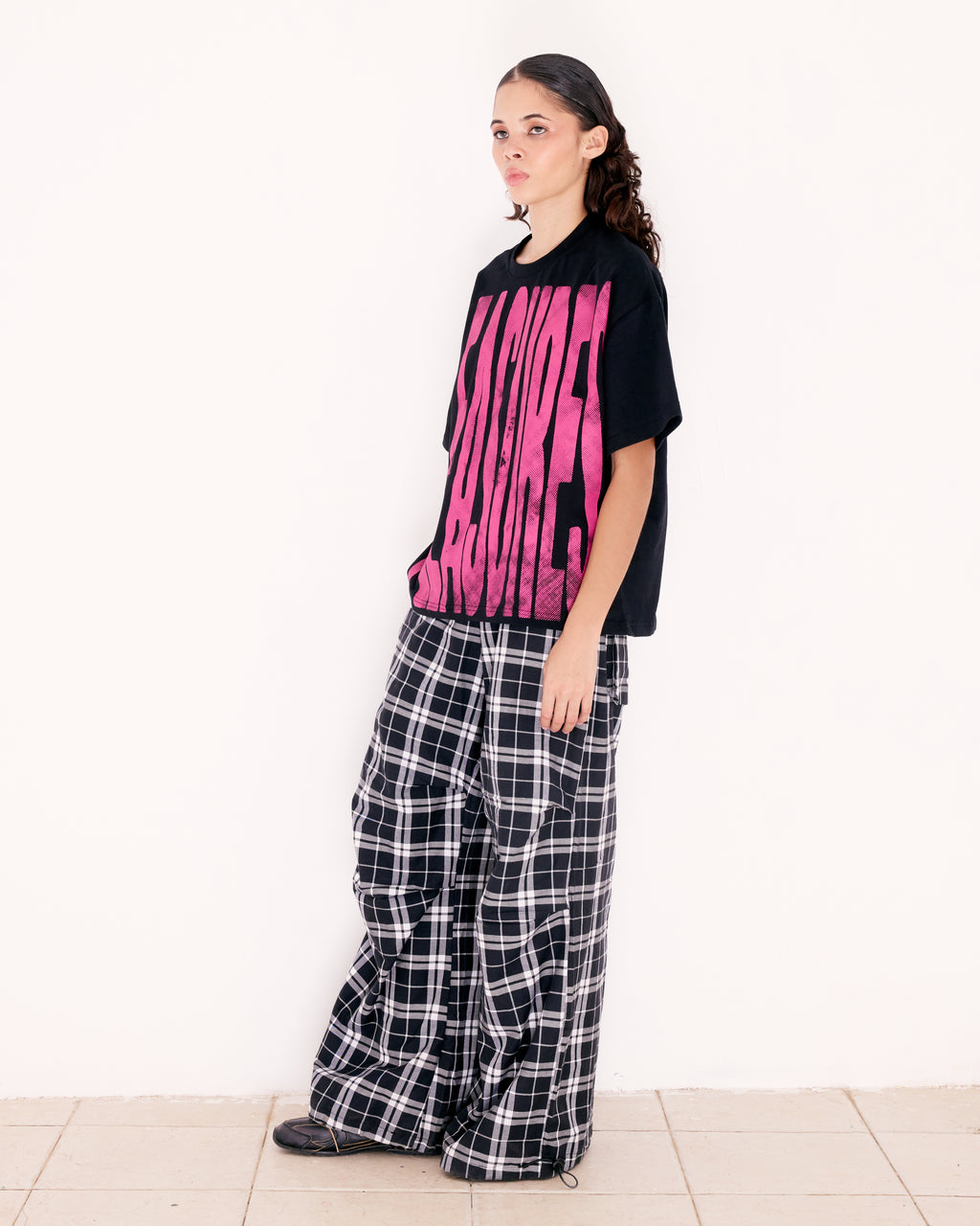 PLEASURES TEE