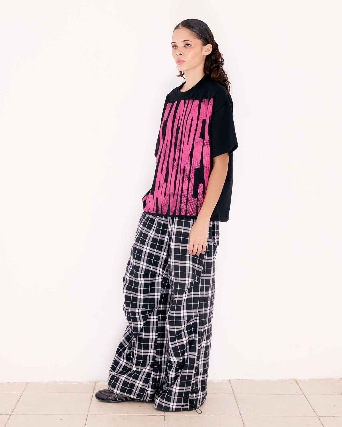 PLEASURES TEE