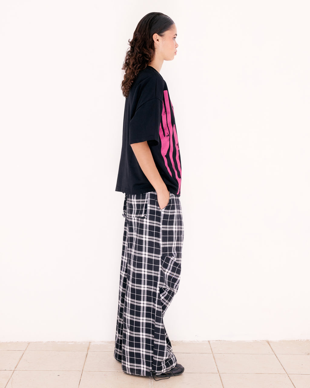 PLEASURES TEE
